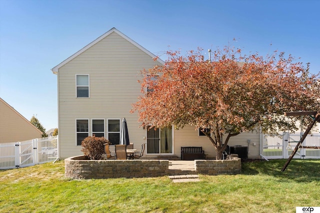 8815 N Hws Cleveland Blvd, Bennington, NE 68007 - rear view of property with a gate, a fenced backyard, and a patio area
