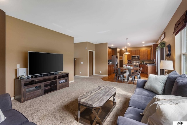 8815 N Hws Cleveland Blvd, Bennington, NE 68007 - carpeted living room featuring baseboards and recessed lighting