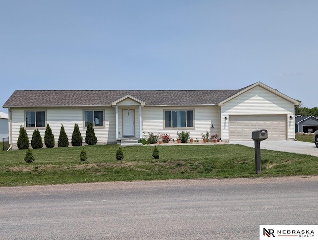 2496 Rock Creek Rd, Bee, NE 68314 - ranch-style home featuring a garage, a front yard, concrete driveway, entry steps, and roof with shingles