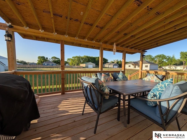 2496 Rock Creek Rd, Bee, NE 68314 - wooden deck with outdoor dining area and a grill