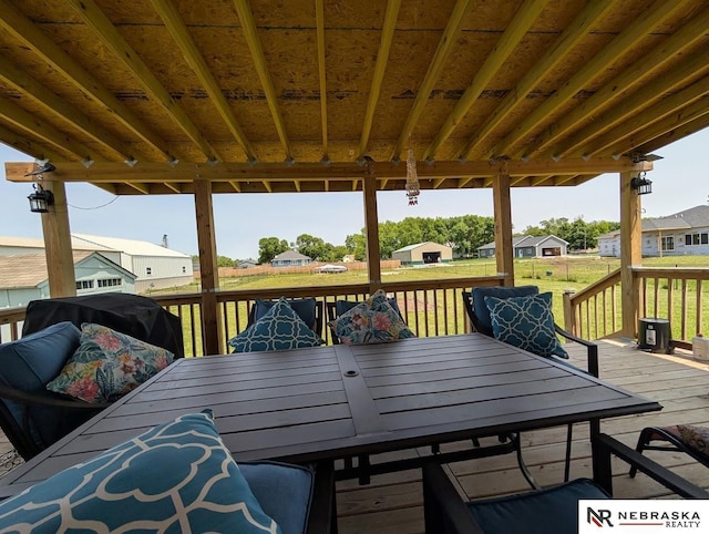 2496 Rock Creek Rd, Bee, NE 68314 - wooden terrace featuring outdoor dining space and a residential view
