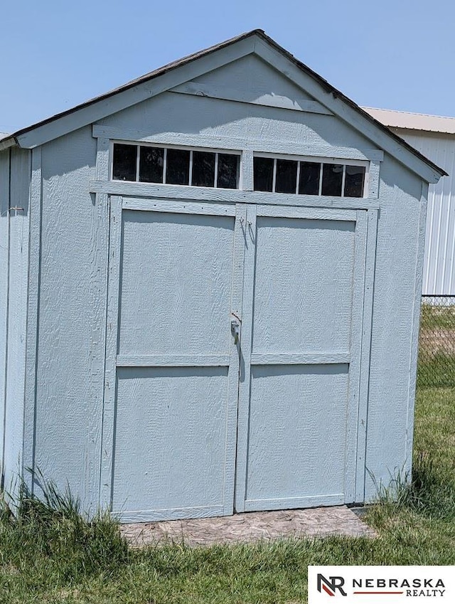 2496 Rock Creek Rd, Bee, NE 68314 - garage featuring a storage shed