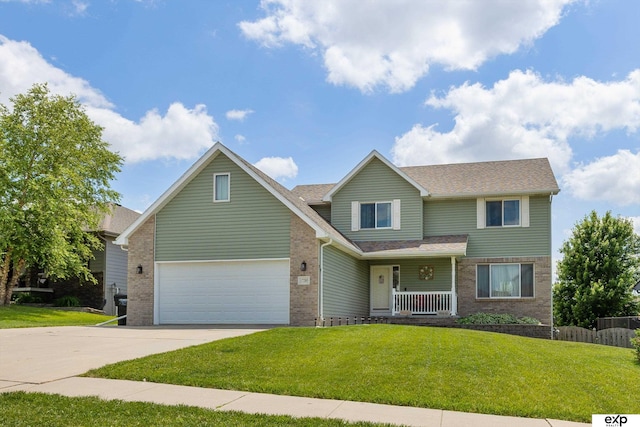 17205 Jessica Ln, Gretna, NE 68028 - view of front of house with covered porch, driveway, brick siding, a front lawn, and a garage