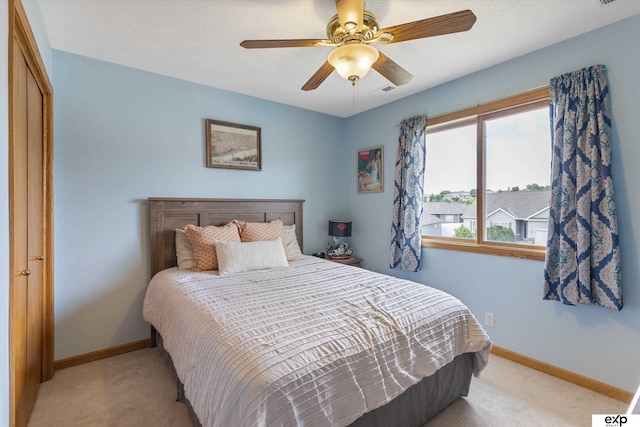 17205 Jessica Ln, Gretna, NE 68028 - carpeted bedroom with baseboards and a ceiling fan