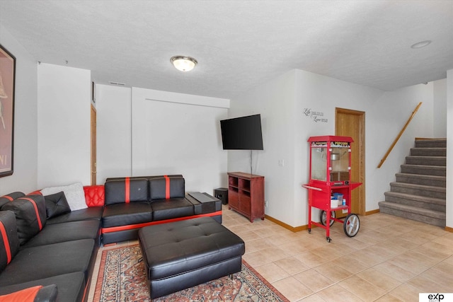 17205 Jessica Ln, Gretna, NE 68028 - living room with stairs, light tile patterned flooring, and a textured ceiling