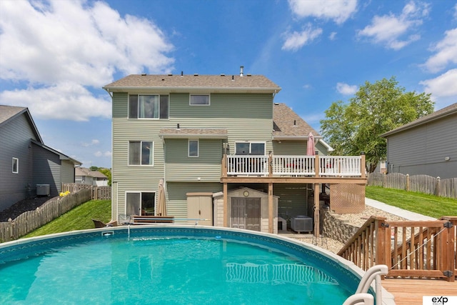 17205 Jessica Ln, Gretna, NE 68028 - back of property featuring a wooden deck, a fenced backyard, and roof with shingles