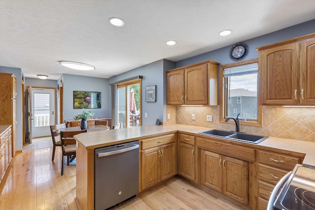 17205 Jessica Ln, Gretna, NE 68028 - kitchen featuring dishwasher, plenty of natural light, light countertops, and recessed lighting