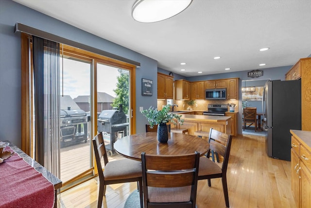 17205 Jessica Ln, Gretna, NE 68028 - dining area with light wood-type flooring and recessed lighting