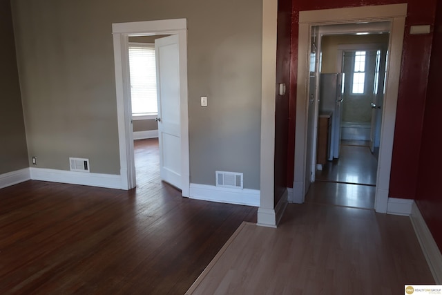 2722 N 64th St, Omaha, NE 68104 - hall featuring baseboards and wood finished floors