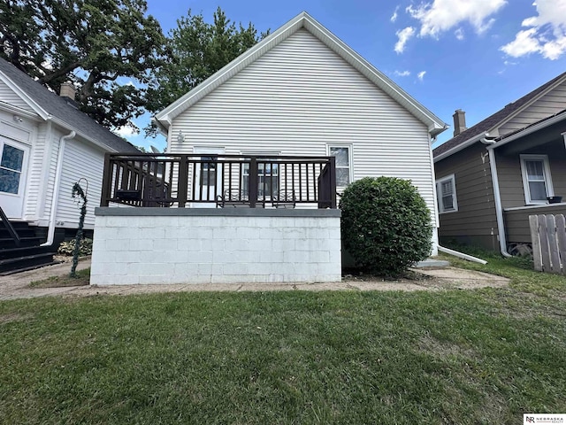 2329 S 11th St, Omaha, NE 68108 - rear view of house featuring a yard and a deck