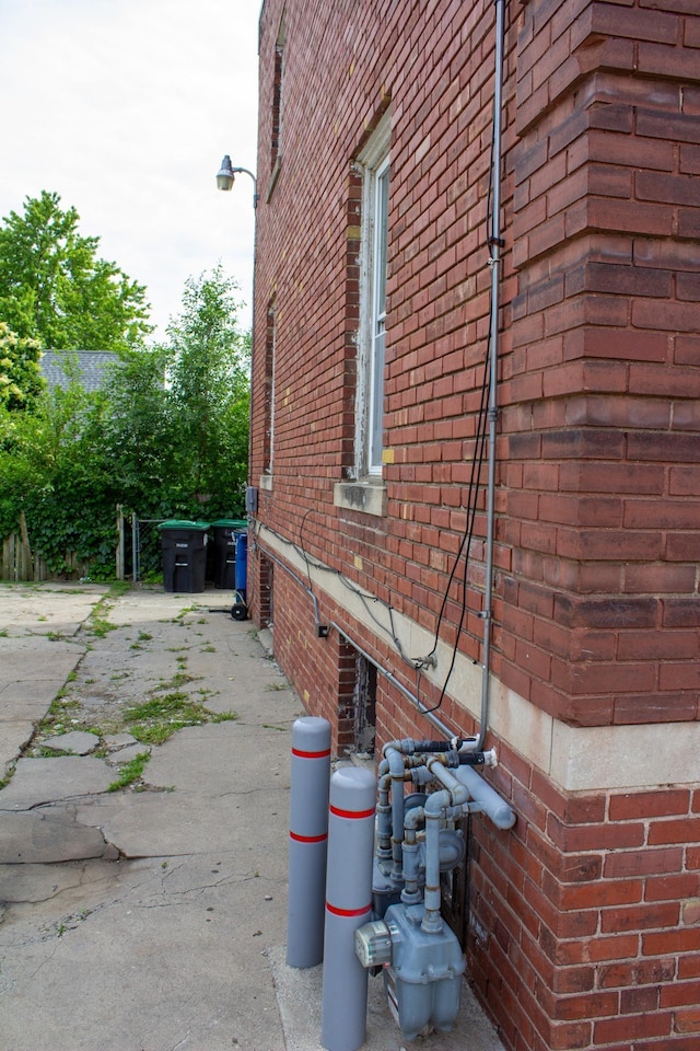 818 S 26th St, Omaha, NE 68105 - view of property exterior featuring brick siding