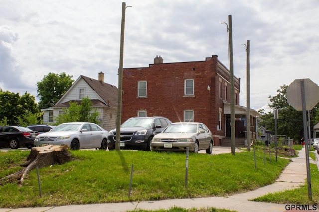 818 S 26th St, Omaha, NE 68105 - view of home's exterior with brick siding