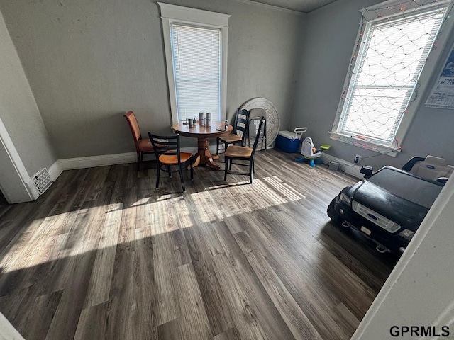 818 S 26th St, Omaha, NE 68105 - dining room with wood finished floors and baseboards