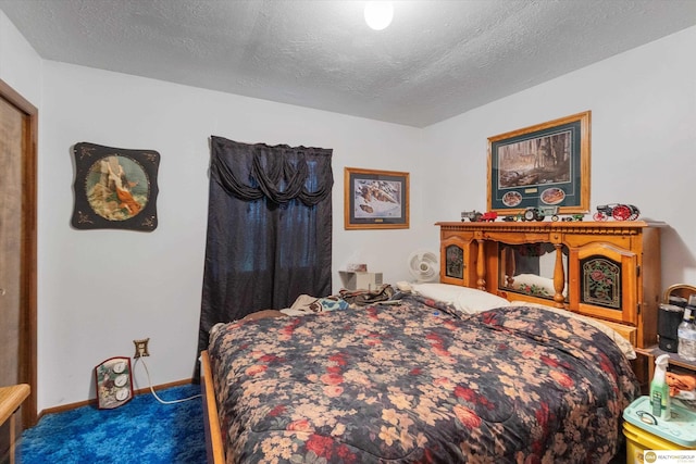 209 Carter St, Avoca, NE 68307 - carpeted bedroom with a textured ceiling