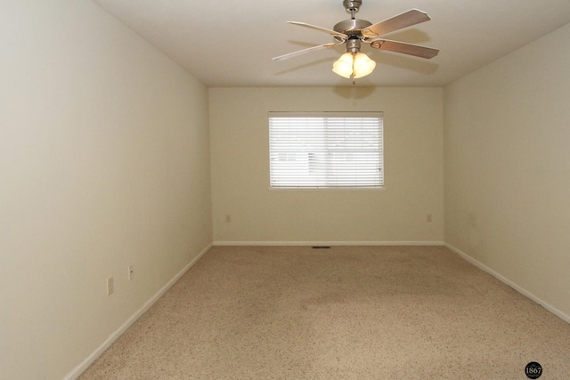 6028 Glenbrook Ln, Lincoln, NE 68512 - carpeted empty room with ceiling fan and baseboards