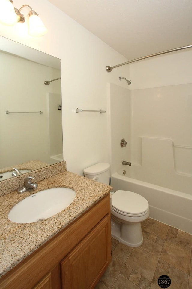 6028 Glenbrook Ln, Lincoln, NE 68512 - bathroom with vanity, bathing tub / shower combination, and toilet