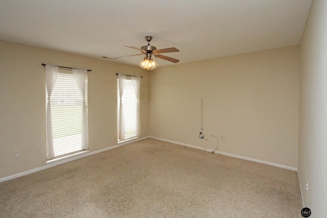 6028 Glenbrook Ln, Lincoln, NE 68512 - empty room with ceiling fan, baseboards, and carpet