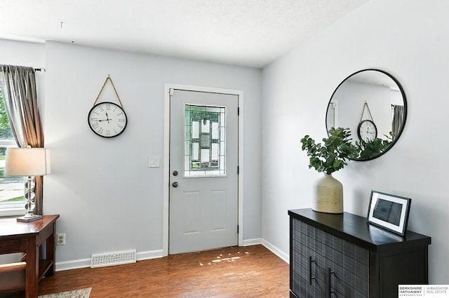 9704 Erskine St, Omaha, NE 68134 - foyer entrance with plenty of natural light and wood finished floors