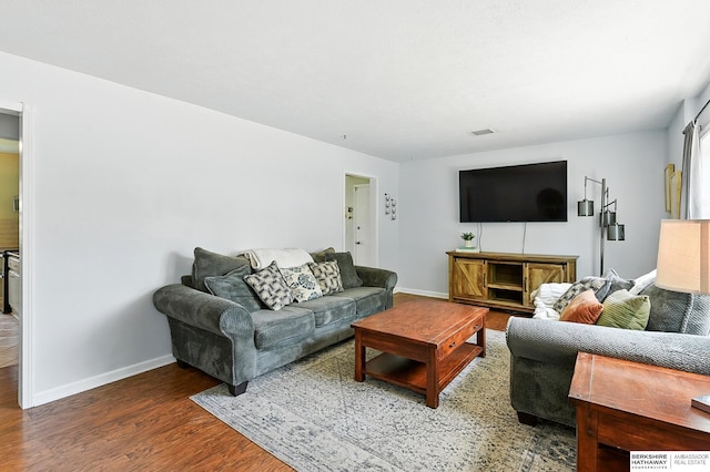 9704 Erskine St, Omaha, NE 68134 - living room featuring wood finished floors and baseboards