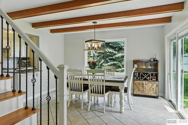 9704 Erskine St, Omaha, NE 68134 - dining space with beam ceiling, tile patterned floors, a chandelier, and stairway