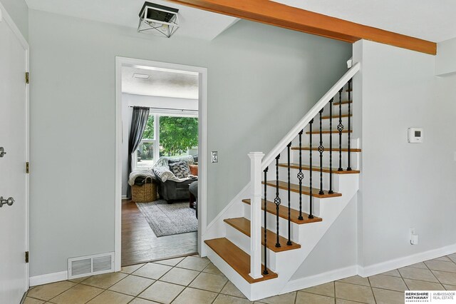 9704 Erskine St, Omaha, NE 68134 - stairway with tile patterned flooring