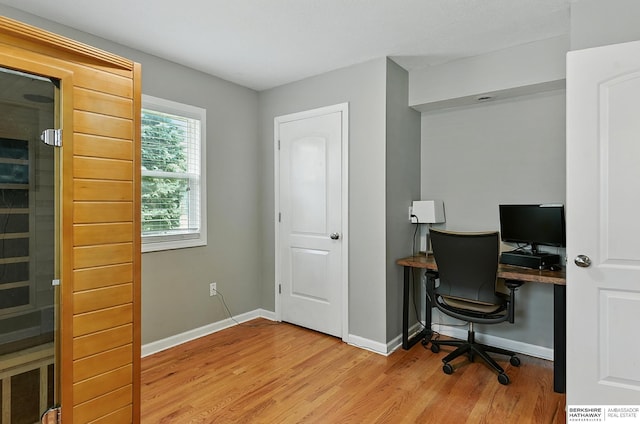 9704 Erskine St, Omaha, NE 68134 - office area featuring light wood finished floors and a sauna