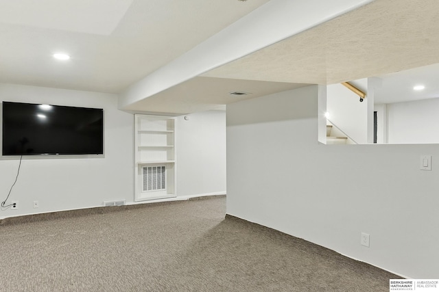 9704 Erskine St, Omaha, NE 68134 - finished below grade area with carpet flooring, recessed lighting, and stairs