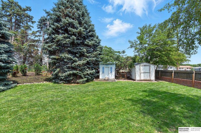 9704 Erskine St, Omaha, NE 68134 - view of yard featuring a shed