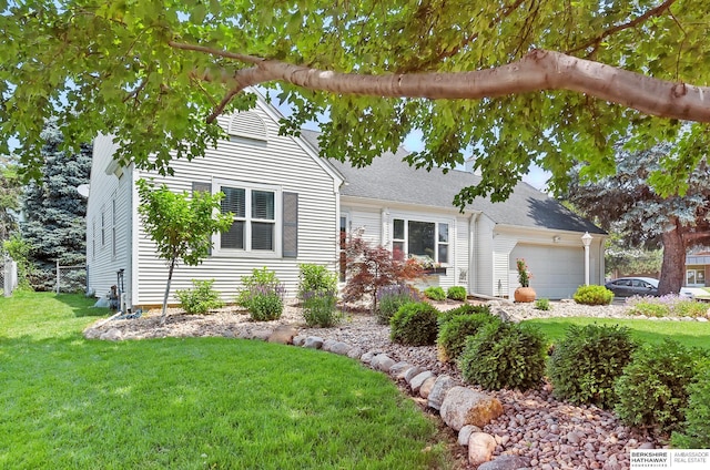 9704 Erskine St, Omaha, NE 68134 - view of front of home with an attached garage, a front lawn, and a shingled roof