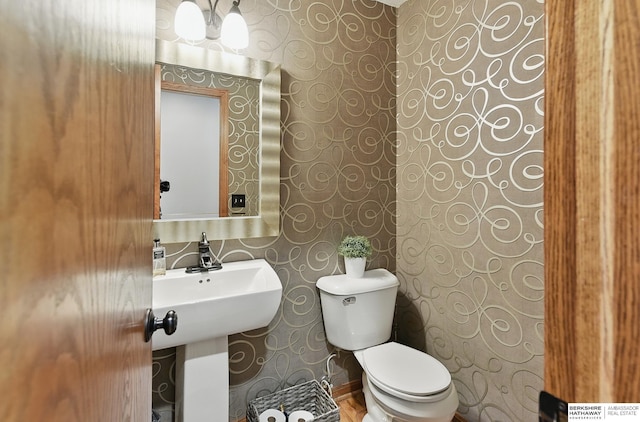 2468 N 148th St, Omaha, NE 68116 - bathroom featuring wallpapered walls and toilet