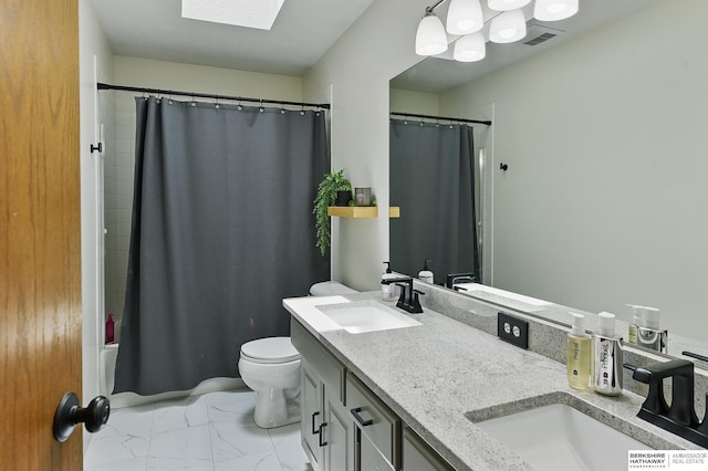 2468 N 148th St, Omaha, NE 68116 - full bath featuring marble look tiles, double vanity, toilet, shower / bath combo, and a skylight