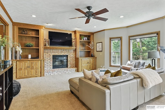 2468 N 148th St, Omaha, NE 68116 - carpeted living room with a brick fireplace, a ceiling fan, recessed lighting, and crown molding