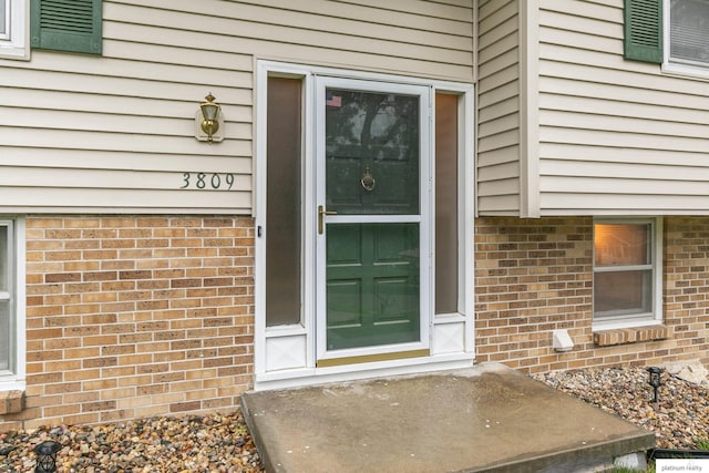 3809 N 94th St, Omaha, NE 68134 - property entrance featuring brick siding