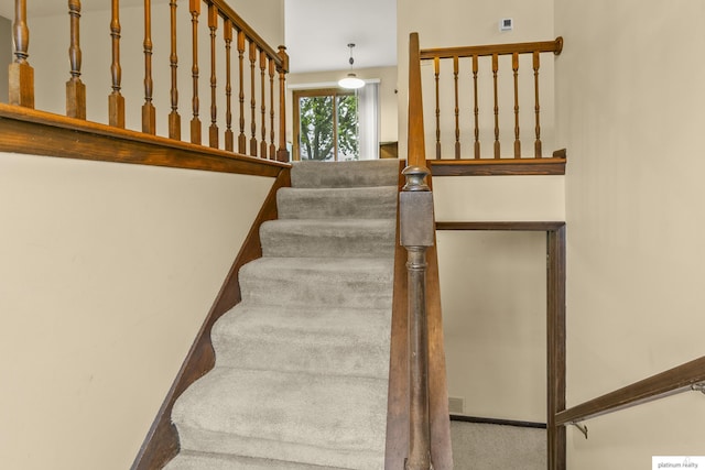 3809 N 94th St, Omaha, NE 68134 - staircase featuring carpet