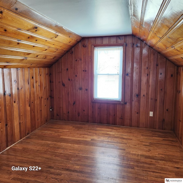 2134 S 48th St, Omaha, NE 68106 - bonus room with wood-type flooring, lofted ceiling, and wood walls