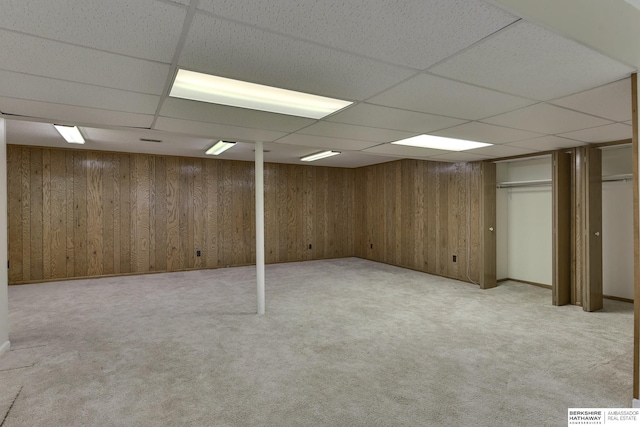 337 N 91st St, Omaha, NE 68114 - finished below grade area with a drop ceiling, light carpet, and wood walls
