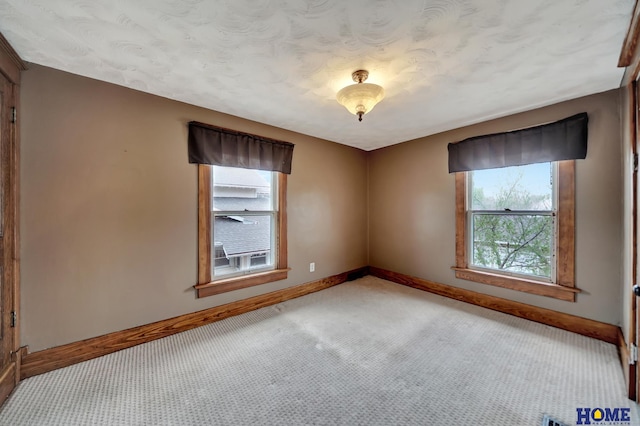 2524 S St, Lincoln, NE 68503 - empty room with carpet and baseboards