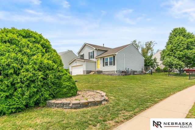 13518 Westport Cir, Bellevue, NE 68123 - view of front of property with a front lawn, a garage, and cooling unit