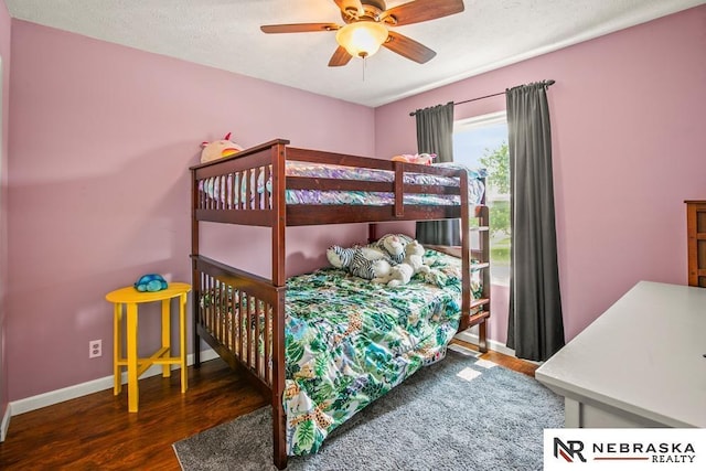 13518 Westport Cir, Bellevue, NE 68123 - bedroom featuring wood finished floors and baseboards
