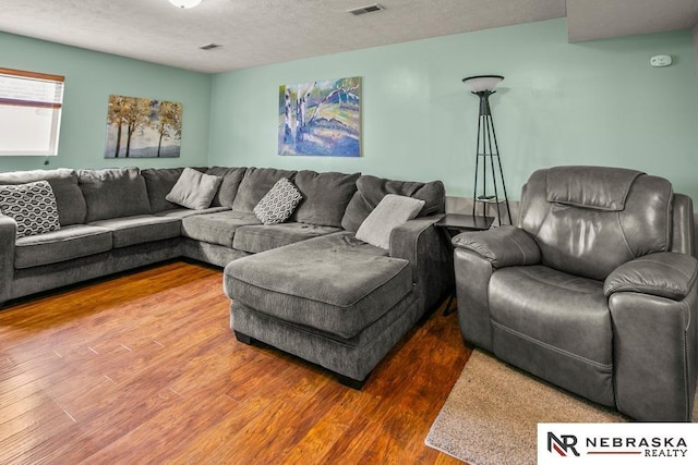 13518 Westport Cir, Bellevue, NE 68123 - living room with wood finished floors and a textured ceiling