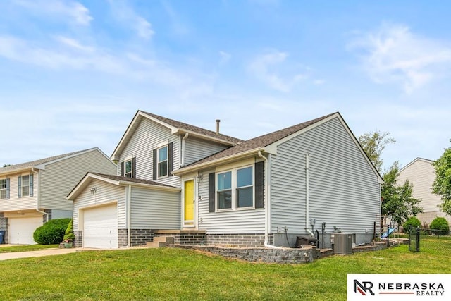 13518 Westport Cir, Bellevue, NE 68123 - view of front of home featuring concrete driveway and central AC
