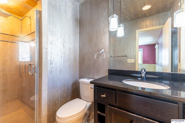 10615 Martha St, Omaha, NE 68124 - full bathroom with toilet, vanity, and a stall shower
