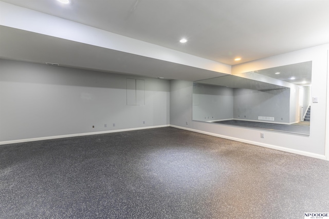 10615 Martha St, Omaha, NE 68124 - finished below grade area with baseboards, recessed lighting, and stairway