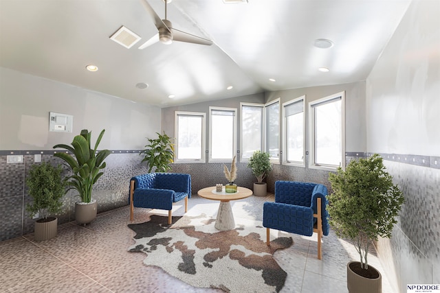10615 Martha St, Omaha, NE 68124 - community lobby featuring wainscoting, vaulted ceiling, tile walls, and recessed lighting