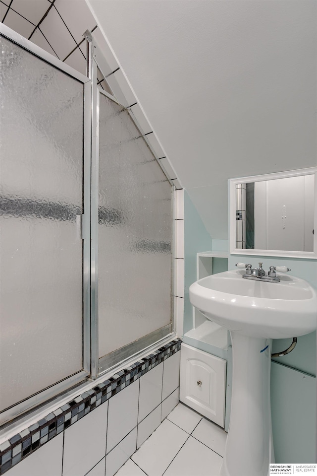 4459 F St, Omaha, NE 68107 - bathroom with an enclosed shower and tile patterned floors