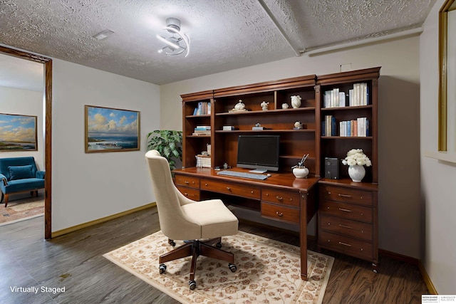 4459 F St, Omaha, NE 68107 - office area with a textured ceiling, dark wood-style flooring, and baseboards