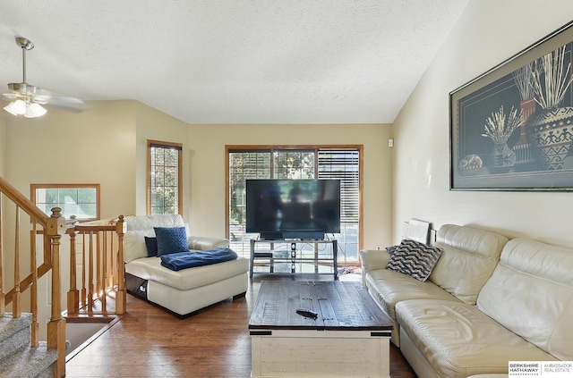 8853 N 82nd Ave, Omaha, NE 68122 - living area with a textured ceiling, dark wood finished floors, and ceiling fan