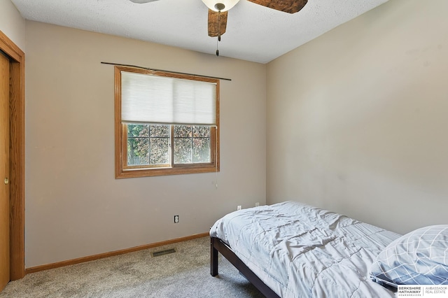 8853 N 82nd Ave, Omaha, NE 68122 - carpeted bedroom with baseboards and ceiling fan