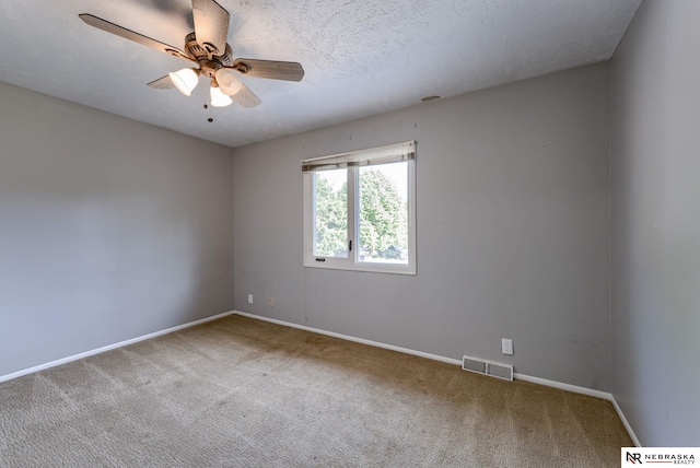 2223 S 161st Cir, Omaha, NE 68130 - carpeted spare room featuring a ceiling fan and baseboards
