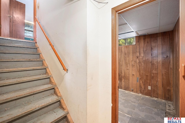 5704 N 68th St, Omaha, NE 68104 - stairs featuring wood walls